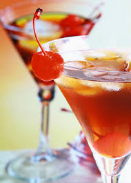 two vermouth cocktails with cherry