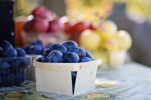 fresh fruit on display, blueberries, plums, nectarines