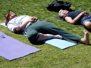 yoga lying down on grass