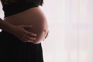 pregnant woman dressed in black