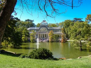 crystal palace with pond and garden in madrid
