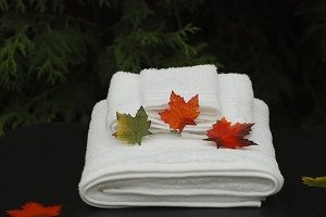 autumn leaves on spa towels