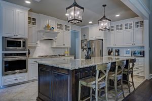 white kitchen with marble counter