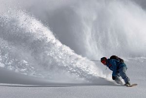 man snowboarding