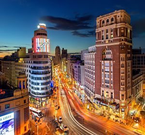 gran via in madrid in dark with lights from traffic
