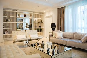 modern living room with leather couches and glass table