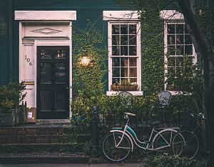 exterior home with stairs and bicycle