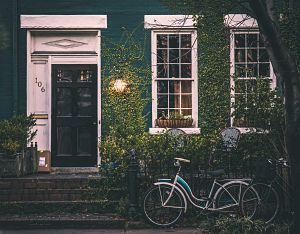 entrance of house with bicycle in front