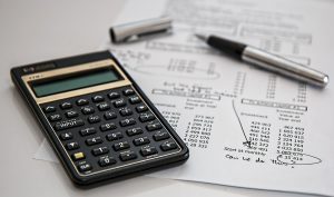 calculator, pen and papers