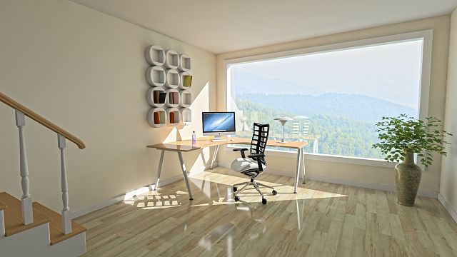 desk in front of large window
