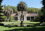 pond and building at royal botanial gardens madrid