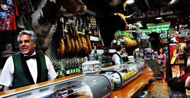 inside a bar with a waiter