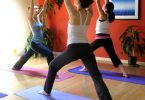 group doing yoga inside