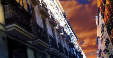 buildings in chueca with red sky