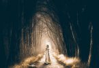 girl in dark forest