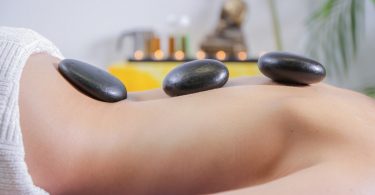 hot stone massage on body