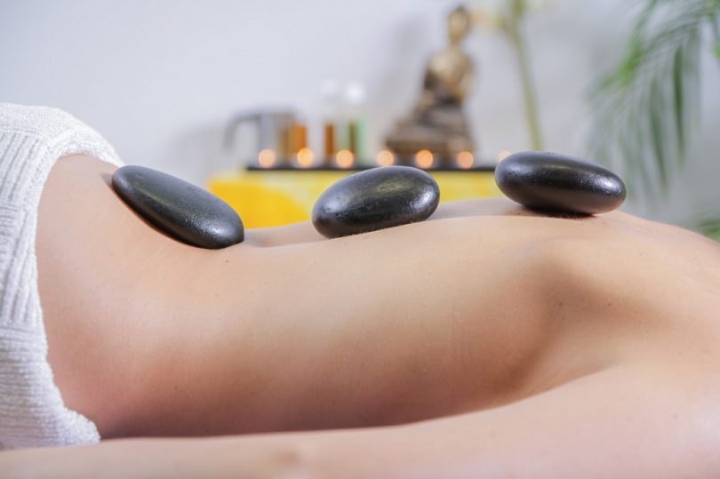 hot stone massage on body