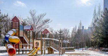 playground in a bit of snow