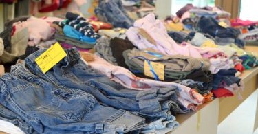 piles of second-hand clothes laid