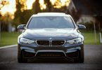 front of grey bmw
