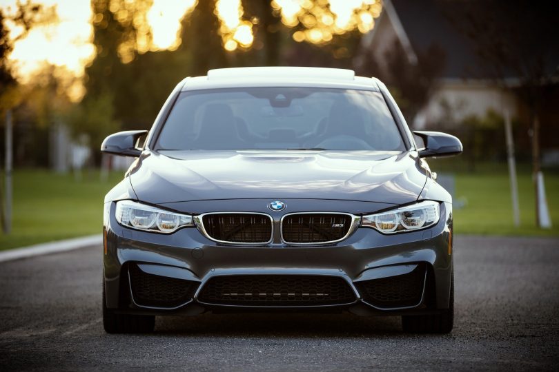 front of grey bmw