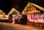 Christmas market stalls in dark