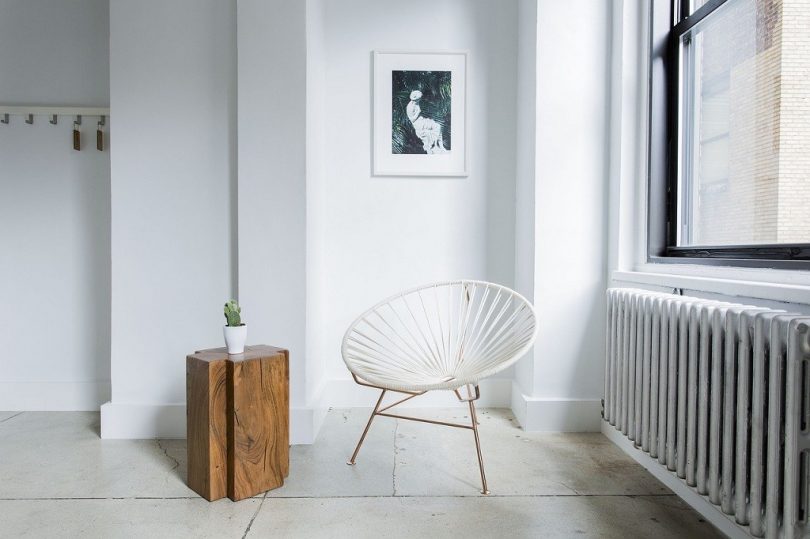 modern hall with chair and painting